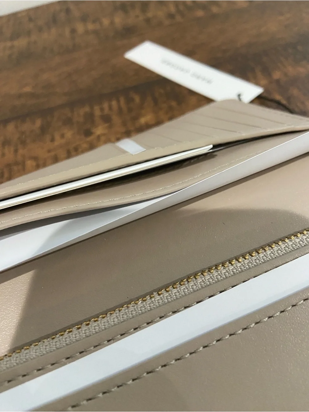 Marc Jacobs Signet Turnlock Slim Wallet in the Color Iced Coffee